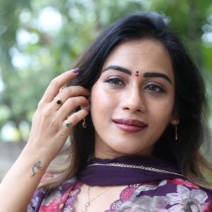 Preeti Sunder Elegant Floral Purple Outfit with Traditional Jewelry