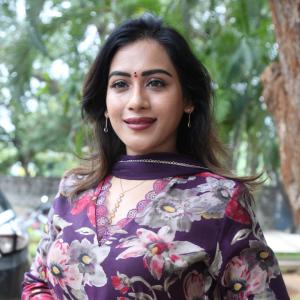 Preeti Sunder Elegant Floral Purple Outfit with Traditional Jewelry