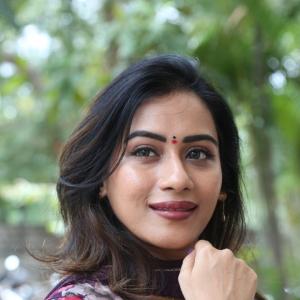 Preeti Sunder Elegant Floral Purple Outfit with Traditional Jewelry