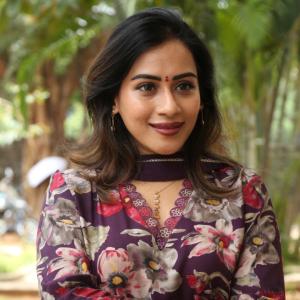 Preeti Sunder Elegant Floral Purple Outfit with Traditional Jewelry