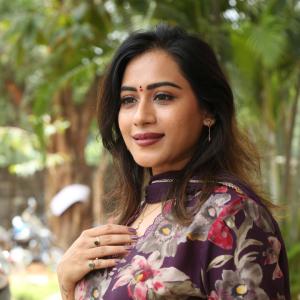 Preeti Sunder Elegant Floral Purple Outfit with Traditional Jewelry