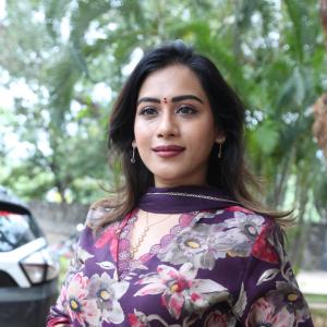 Preeti Sunder Elegant Floral Purple Outfit with Traditional Jewelry