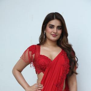 Nidhhi Agerwal Dazzles in Elegant Red Saree with Embroidered Blouse