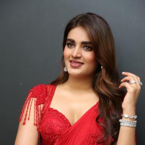 Nidhhi Agerwal Dazzles in Elegant Red Saree with Embroidered Blouse