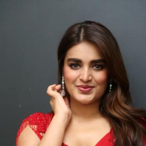 Nidhhi Agerwal Dazzles in Elegant Red Saree with Embroidered Blouse