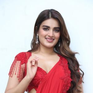 Nidhhi Agerwal Dazzles in Elegant Red Saree with Embroidered Blouse