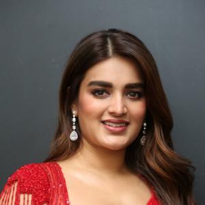 Nidhhi Agerwal Dazzles in Elegant Red Saree with Embroidered Blouse