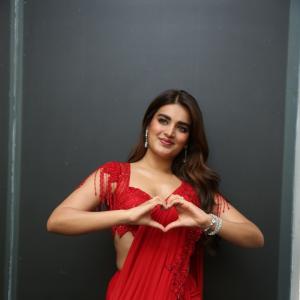 Nidhhi Agerwal Dazzles in Elegant Red Saree with Embroidered Blouse