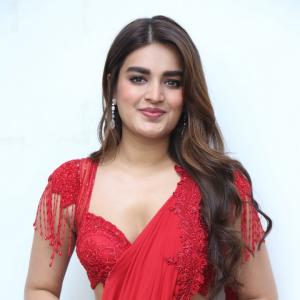 Nidhhi Agerwal Dazzles in Elegant Red Saree with Embroidered Blouse