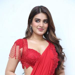 Nidhhi Agerwal Dazzles in Elegant Red Saree with Embroidered Blouse