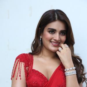 Nidhhi Agerwal Dazzles in Elegant Red Saree with Embroidered Blouse