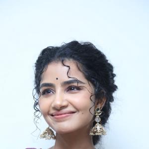 Anupama Parameswaran Looks Elegant in Maroon Anarkali Suit with Traditional Jhumkas