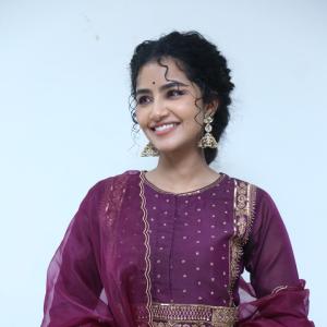 Anupama Parameswaran Looks Elegant in Maroon Anarkali Suit with Traditional Jhumkas