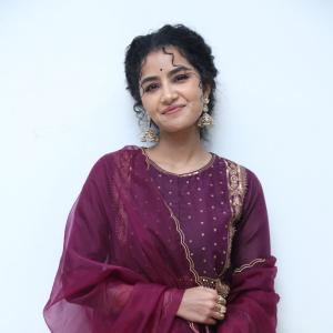 Anupama Parameswaran Looks Elegant in Maroon Anarkali Suit with Traditional Jhumkas