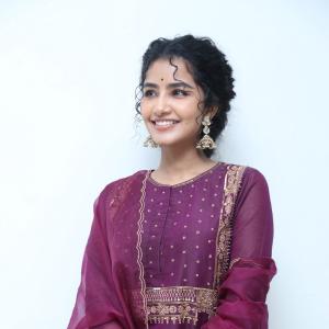 Anupama Parameswaran Looks Elegant in Maroon Anarkali Suit with Traditional Jhumkas