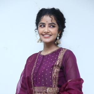 Anupama Parameswaran Looks Elegant in Maroon Anarkali Suit with Traditional Jhumkas