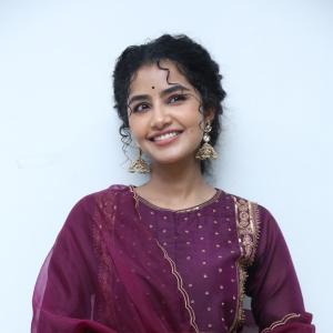 Anupama Parameswaran Looks Elegant in Maroon Anarkali Suit with Traditional Jhumkas