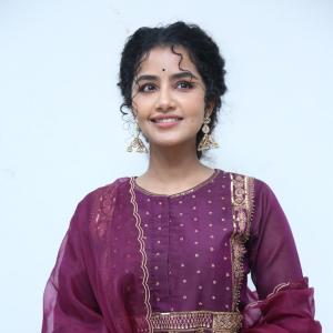 Anupama Parameswaran Looks Elegant in Maroon Anarkali Suit with Traditional Jhumkas