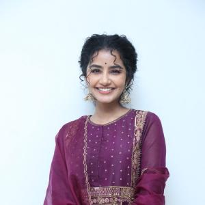 Anupama Parameswaran Looks Elegant in Maroon Anarkali Suit with Traditional Jhumkas