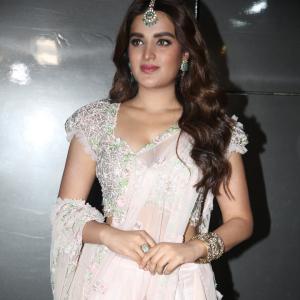 Nidhi Agerwal's Elegant Look in a Light Pink Lehenga Choli