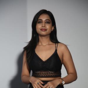 Ritika Chakravarthy Stunning Look in Black Lace Crop Top and Shimmering Skirt at Fashion Event