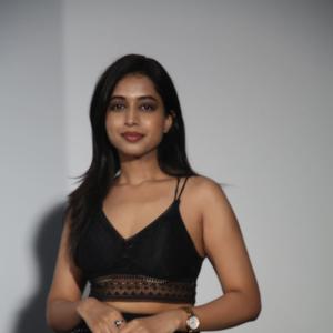 Ritika Chakravarthy Stunning Look in Black Lace Crop Top and Shimmering Skirt at Fashion Event