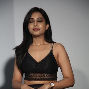 Ritika Chakravarthy Stunning Look in Black Lace Crop Top and Shimmering Skirt at Fashion Event