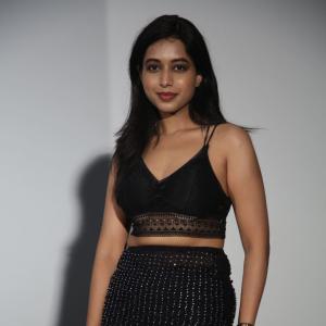 Ritika Chakravarthy Stunning Look in Black Lace Crop Top and Shimmering Skirt at Fashion Event