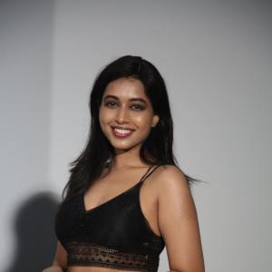 Ritika Chakravarthy Stunning Look in Black Lace Crop Top and Shimmering Skirt at Fashion Event