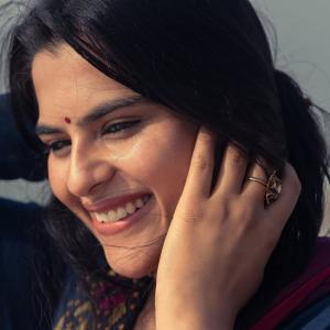 Kavya KalyanRam in Maroon Saree by the Beach | Graceful Ethnic Look