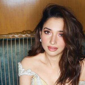 Tamanna Bhatia Stuns in Yellow Gown: Glamorous Photoshoot Look