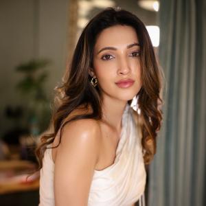 Neha Shetty's Elegant Look: Stunning Close-Up Shot in White Dress
