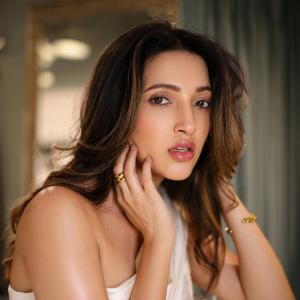 Neha Shetty's Elegant Look: Stunning Close-Up Shot in White Dress