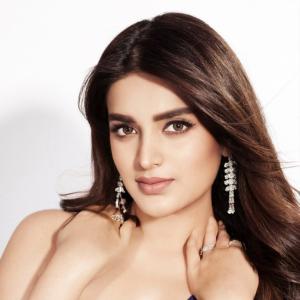 Nidhhi Agerwal Exudes Elegance in a Blue Beaded Gown