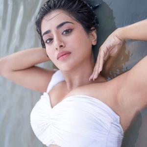 Actress Rashi Singh Stunning White Outfit Photoshoot Near Water