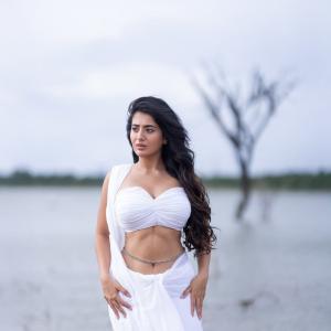 Actress Rashi Singh Stunning White Outfit Photoshoot Near Water