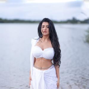 Actress Rashi Singh Stunning White Outfit Photoshoot Near Water