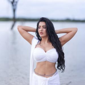 Actress Rashi Singh Stunning White Outfit Photoshoot Near Water