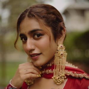 Priya Warrior Stuns in Elegant Red Traditional Look
