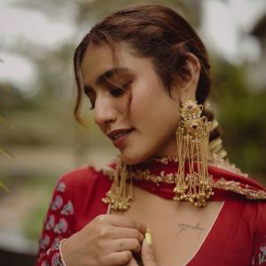 Priya Warrior Stuns in Elegant Red Traditional Look