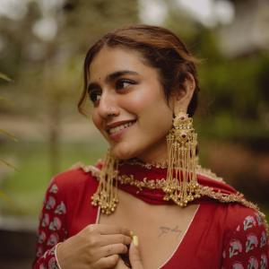 Priya Warrior Stuns in Elegant Red Traditional Look