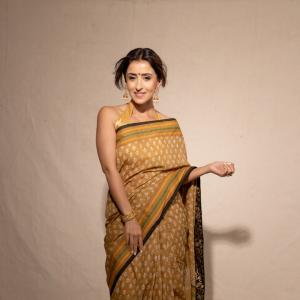 Elegant Golden-Brown Saree with Floral Design | Traditional Indian Attire for Women