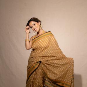Elegant Golden-Brown Saree with Floral Design | Traditional Indian Attire for Women