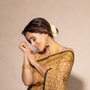 Elegant Golden-Brown Saree with Floral Design | Traditional Indian Attire for Women