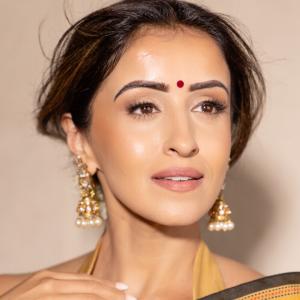 Elegant Golden-Brown Saree with Floral Design | Traditional Indian Attire for Women