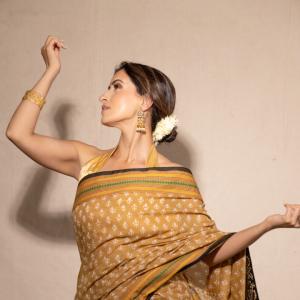 Elegant Golden-Brown Saree with Floral Design | Traditional Indian Attire for Women