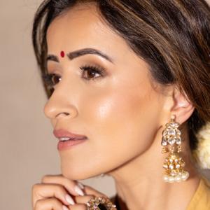 Elegant Golden-Brown Saree with Floral Design | Traditional Indian Attire for Women