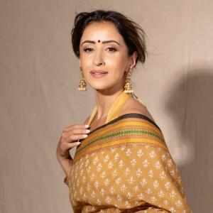 Elegant Golden-Brown Saree with Floral Design | Traditional Indian Attire for Women