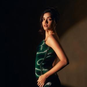 Bhagyasree Borse Stunning in Shimmering Green Outfit - Elegant and Stylish Pose