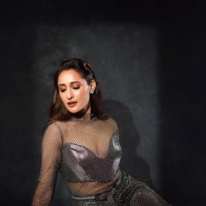Pragya Jaiswal Stunning Look in Metallic Mesh Dress - Glamorous Fashion Statement